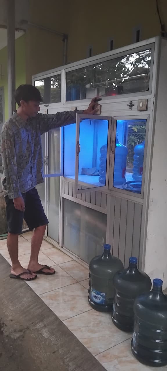 Proses Pengisian Galon